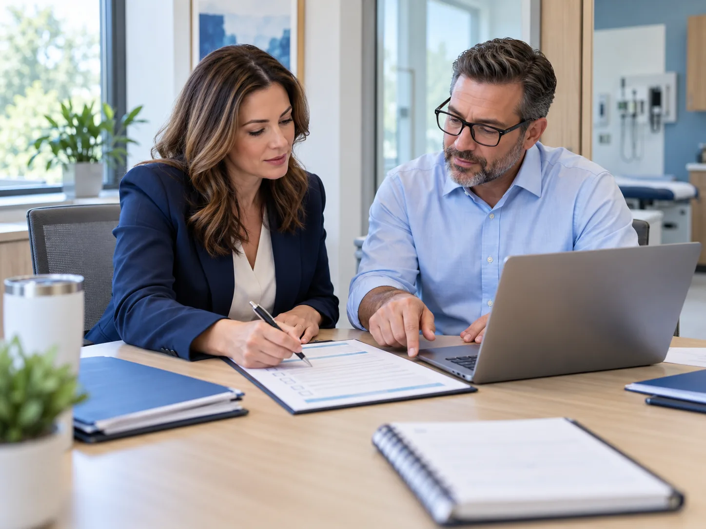 Practice administrator and implementation lead planning the billing handoff